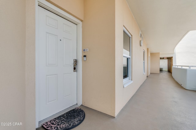 10811 Front Beach Rd Unit 2304, Panama City Beach, FL 32407 - view of exterior entry featuring stucco siding