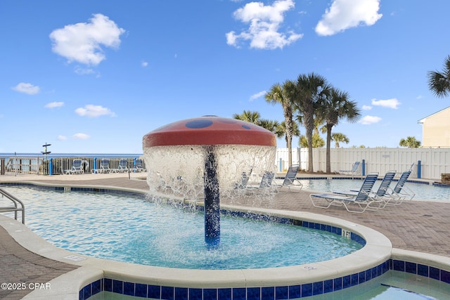 10811 Front Beach Rd Unit 2304, Panama City Beach, FL 32407 - community pool featuring a patio area