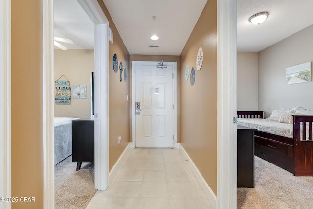 10811 Front Beach Rd Unit 2304, Panama City Beach, FL 32407 - corridor featuring light tile patterned flooring and light colored carpet