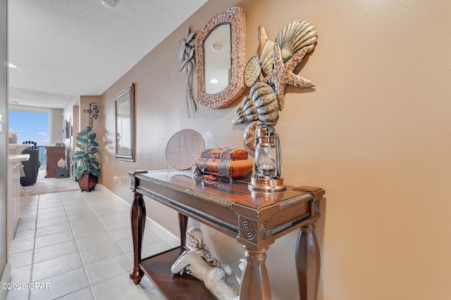 10811 Front Beach Rd Unit 2304, Panama City Beach, FL 32407 - hallway featuring baseboards and light tile patterned floors