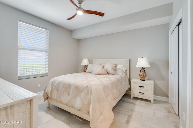 10713 Front Beach Rd Unit 904, Panama City Beach, FL 32407 - bedroom with a closet, light marble finish floors, and ceiling fan