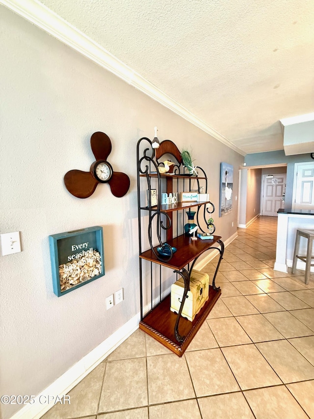 14701 Front Beach Rd Unit 536, Panama City Beach, FL 32413 - hallway featuring light tile patterned flooring, ornamental molding, and a textured ceiling