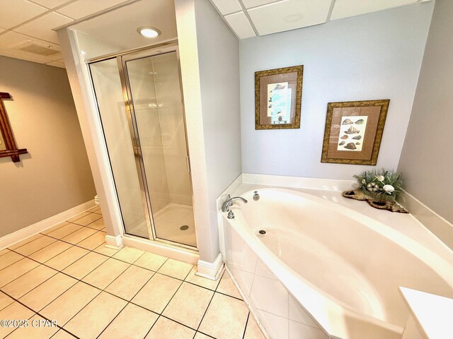 14701 Front Beach Rd Unit 536, Panama City Beach, FL 32413 - full bath featuring a paneled ceiling, a bath, tile patterned floors, and a stall shower
