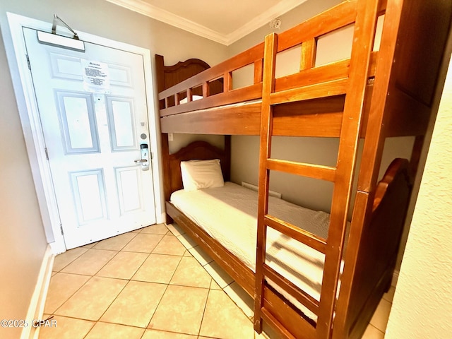 14701 Front Beach Rd Unit 536, Panama City Beach, FL 32413 - unfurnished bedroom featuring crown molding and light tile patterned flooring