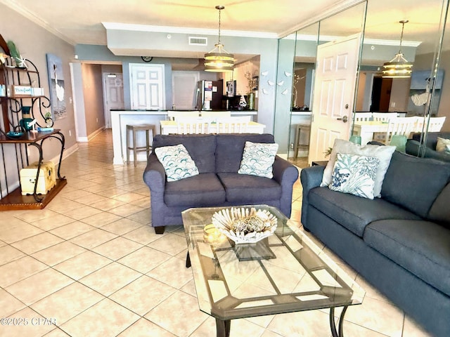 14701 Front Beach Rd Unit 536, Panama City Beach, FL 32413 - living area featuring crown molding and light tile patterned floors