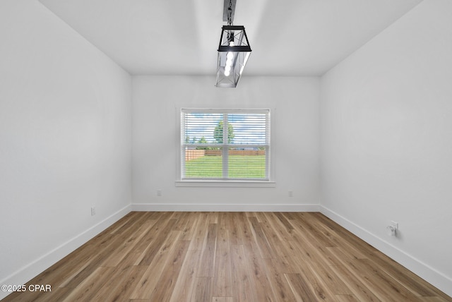 1306 E 26th St, Lynn Haven, FL 32444 - unfurnished dining area featuring light wood-style flooring and baseboards