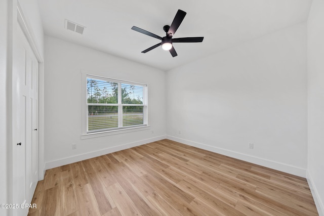 1306 E 26th St, Lynn Haven, FL 32444 - unfurnished bedroom featuring light wood-style flooring, ceiling fan, and a closet