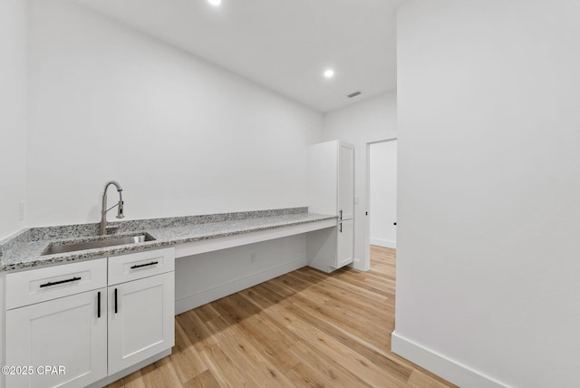 1306 E 26th St, Lynn Haven, FL 32444 - laundry room featuring light wood-style floors and recessed lighting