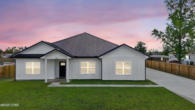 1306 E 26th St, Lynn Haven, FL 32444 - view of front of property featuring board and batten siding and a metal roof