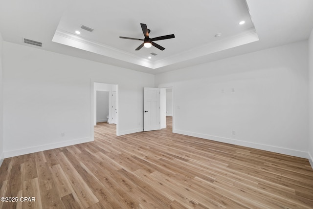 1306 E 26th St, Lynn Haven, FL 32444 - unfurnished bedroom with a raised ceiling, ornamental molding, light wood-type flooring, recessed lighting, and a ceiling fan