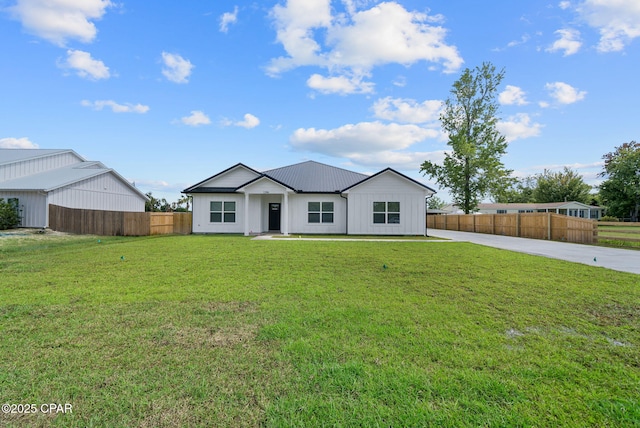 1306 E 26th St, Lynn Haven, FL 32444 - modern farmhouse style home with board and batten siding and a metal roof