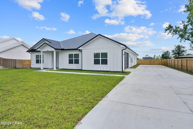 1306 E 26th St, Lynn Haven, FL 32444 - modern farmhouse featuring board and batten siding and concrete driveway