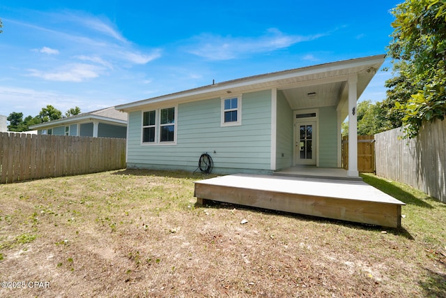 112 Christopher Dr Unit B, Panama City Beach, FL 32413 - back of property with a fenced backyard