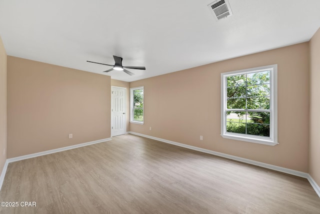 1601 Loblolly Ln, Lynn Haven, FL 32444 - spare room featuring a ceiling fan and wood finished floors