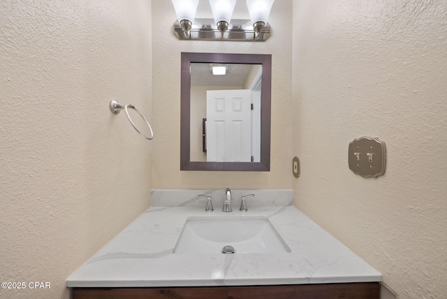 1601 Loblolly Ln, Lynn Haven, FL 32444 - bathroom featuring a textured wall and vanity