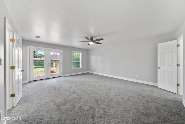 1601 Loblolly Ln, Lynn Haven, FL 32444 - spare room with carpet flooring, a ceiling fan, and french doors