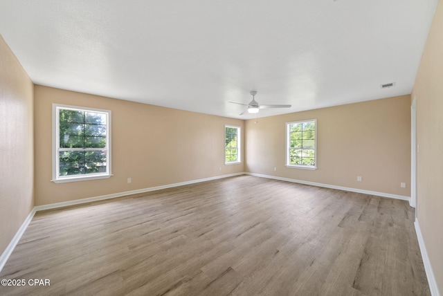 1601 Loblolly Ln, Lynn Haven, FL 32444 - spare room featuring light wood finished floors and a ceiling fan