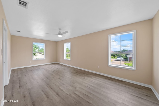 1601 Loblolly Ln, Lynn Haven, FL 32444 - empty room with ceiling fan and wood finished floors