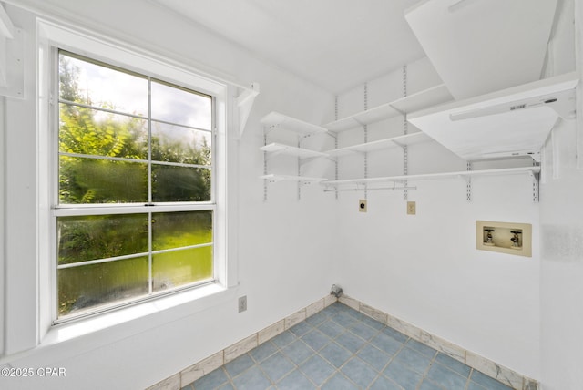 1601 Loblolly Ln, Lynn Haven, FL 32444 - laundry area with hookup for an electric dryer, hookup for a washing machine, and tile patterned floors