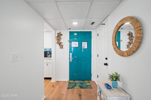 10509 Front Beach Rd Unit 1000, Panama City Beach, FL 32407 - foyer entrance with a drop ceiling, light wood-type flooring, and recessed lighting