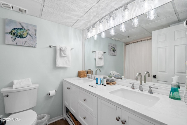 10509 Front Beach Rd Unit 1000, Panama City Beach, FL 32407 - full bath featuring a drop ceiling, double vanity, and a shower with shower curtain