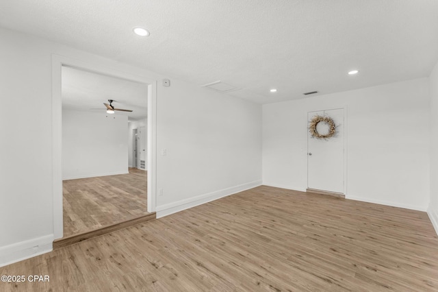 2020 Greenbriar Blvd, Lynn Haven, FL 32444 - spare room featuring wood finished floors, ceiling fan, and recessed lighting