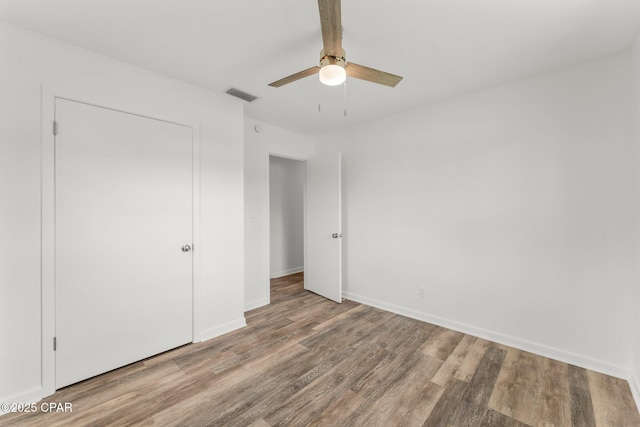 2020 Greenbriar Blvd, Lynn Haven, FL 32444 - unfurnished bedroom with wood finished floors and a ceiling fan