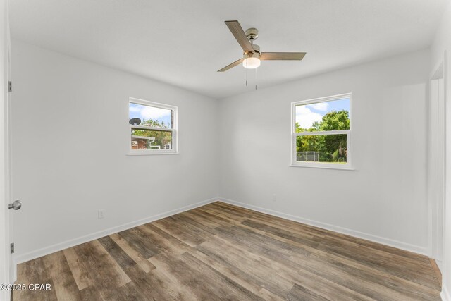 2020 Greenbriar Blvd, Lynn Haven, FL 32444 - unfurnished room featuring ceiling fan and wood finished floors