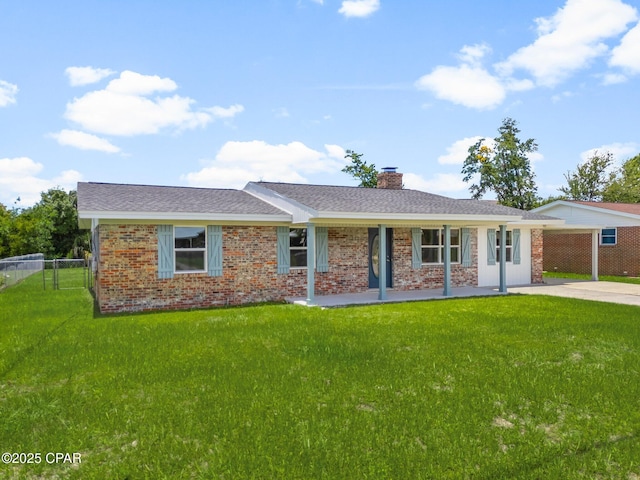 2020 Greenbriar Blvd, Lynn Haven, FL 32444 - ranch-style house with a chimney, brick siding, driveway, and a porch