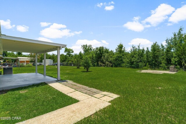 2020 Greenbriar Blvd, Lynn Haven, FL 32444 - view of green lawn with a patio