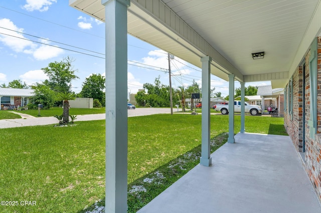 2020 Greenbriar Blvd, Lynn Haven, FL 32444 - porch featuring a lawn