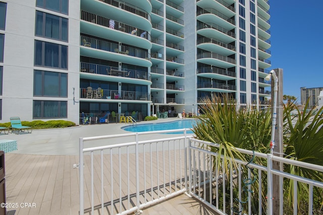 6201 Thomas Dr Unit 1005, Panama City Beach, FL 32408 - view of apartment building / complex with a community pool