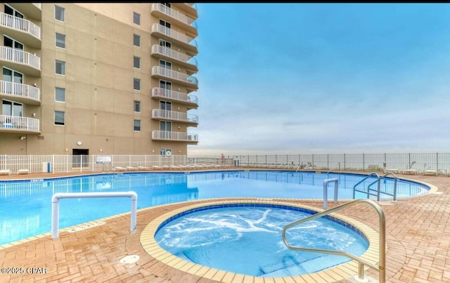 16819 Front Beach Rd Unit 107, Panama City Beach, FL 32413 - community pool with a hot tub
