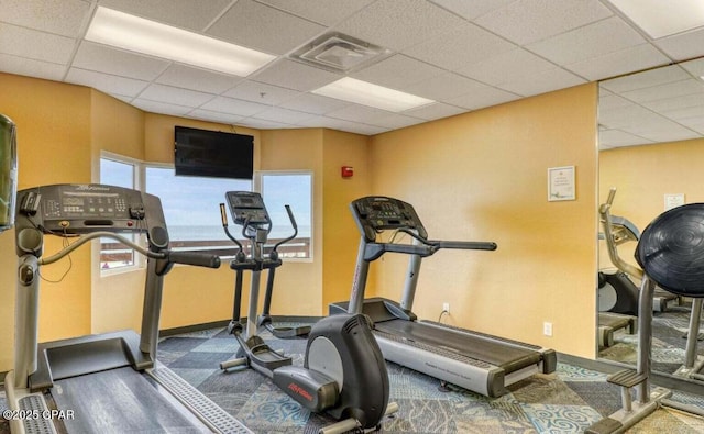 16819 Front Beach Rd Unit 107, Panama City Beach, FL 32413 - workout area with a drop ceiling and carpet floors