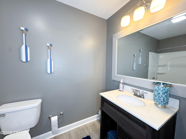 2816 N Panama Ave Unit A & B, Panama City, FL 32405 - full bathroom featuring vanity, wood finished floors, and a shower