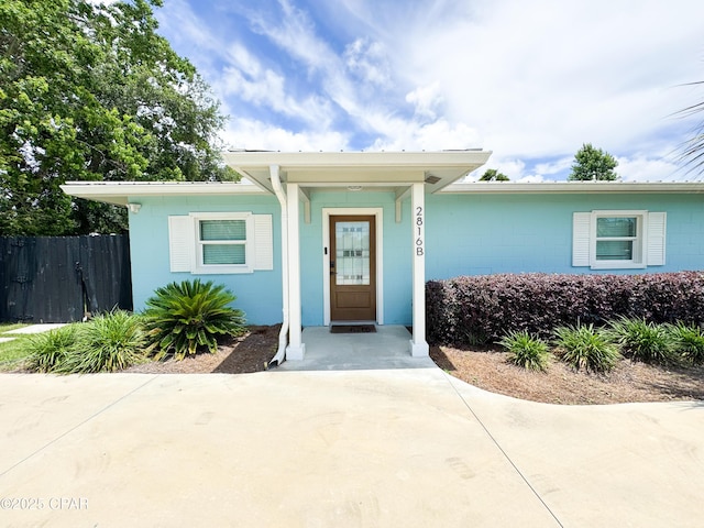 2816 N Panama Ave Unit A & B, Panama City, FL 32405 - view of exterior entry featuring concrete block siding