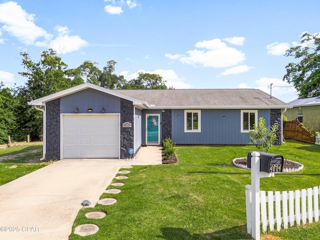 4004 E 7th Cir, Panama City, FL 32404 - view of front of home with stone siding, concrete driveway, and a garage