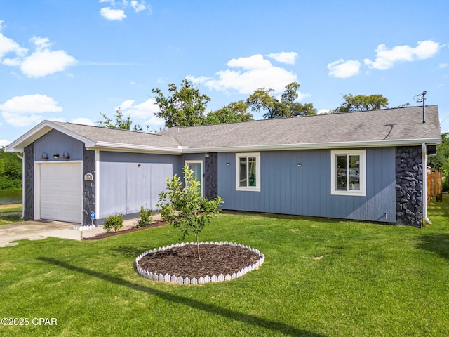 4004 E 7th Cir, Panama City, FL 32404 - ranch-style home with a garage, concrete driveway, a front lawn, and stone siding