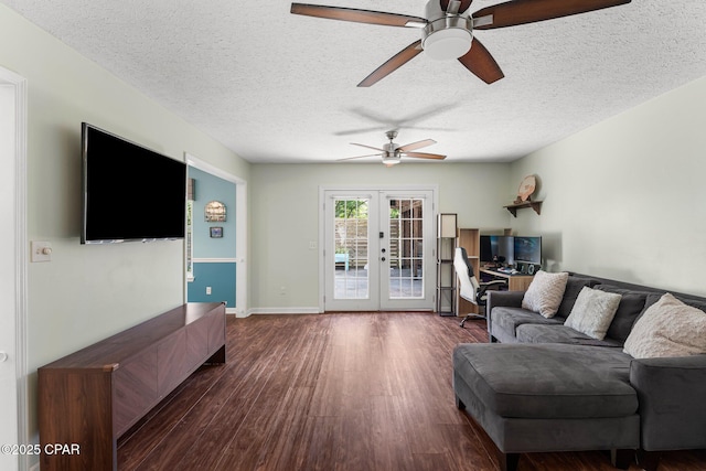 4004 E 7th Cir, Panama City, FL 32404 - living area featuring ceiling fan, french doors, dark wood-type flooring, and a textured ceiling