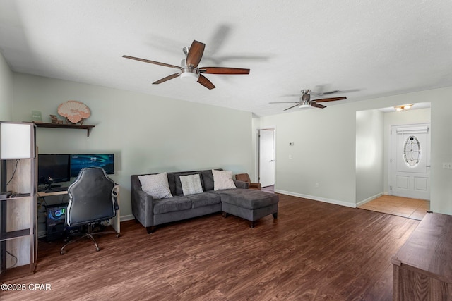 4004 E 7th Cir, Panama City, FL 32404 - living room with a ceiling fan, wood finished floors, and an office area