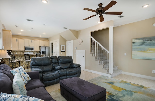 8410 Thomas Dr Unit 1, Panama City Beach, FL 32408 - living area featuring ceiling fan, light tile patterned flooring, stairs, and recessed lighting