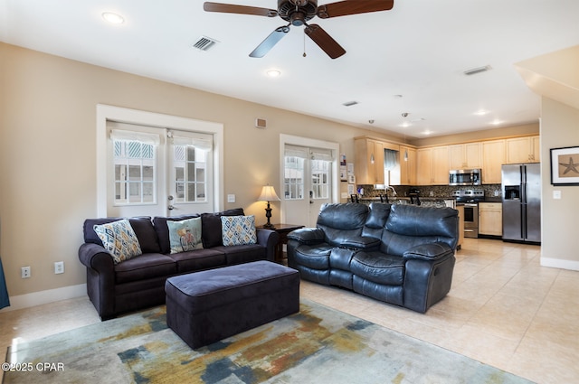 8410 Thomas Dr Unit 1, Panama City Beach, FL 32408 - living room with a ceiling fan, light tile patterned floors, and recessed lighting