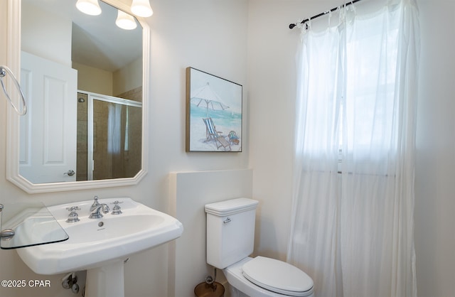 8410 Thomas Dr Unit 1, Panama City Beach, FL 32408 - full bathroom with toilet and tiled shower