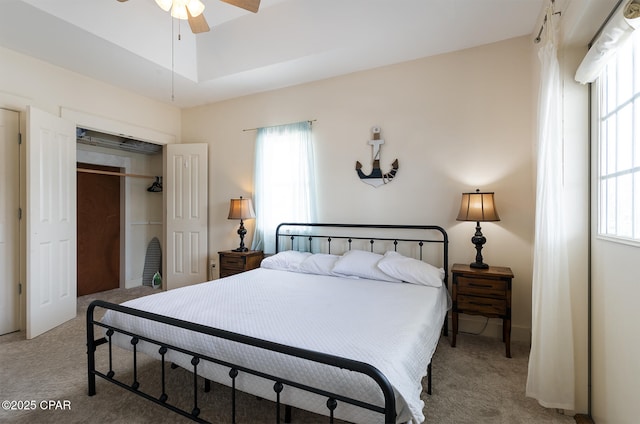 8410 Thomas Dr Unit 1, Panama City Beach, FL 32408 - bedroom with light colored carpet, multiple windows, and a closet