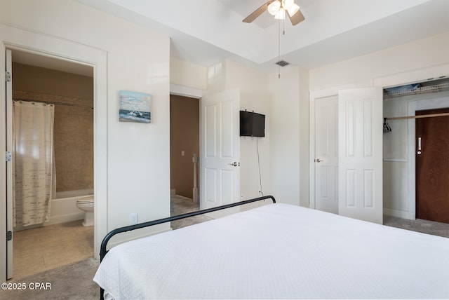 8410 Thomas Dr Unit 1, Panama City Beach, FL 32408 - bedroom featuring a closet, ensuite bathroom, and ceiling fan