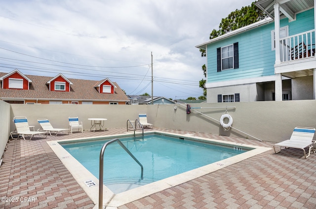 8410 Thomas Dr Unit 1, Panama City Beach, FL 32408 - community pool with a patio area