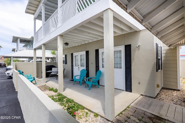 8410 Thomas Dr Unit 1, Panama City Beach, FL 32408 - view of patio featuring french doors