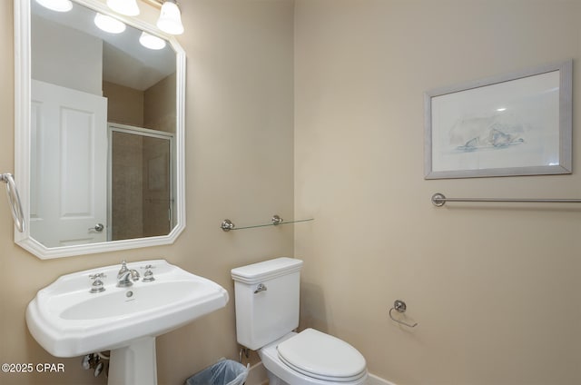 8410 Thomas Dr Unit 1, Panama City Beach, FL 32408 - bathroom with toilet and tiled shower