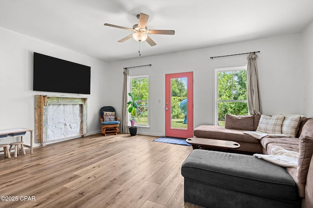 406 Raven Ln, Panama City, FL 32404 - living area featuring a ceiling fan and light wood-style floors