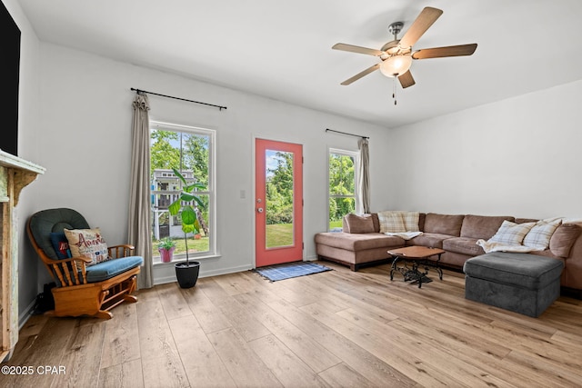 406 Raven Ln, Panama City, FL 32404 - living room featuring healthy amount of natural light, light wood-style floors, and ceiling fan